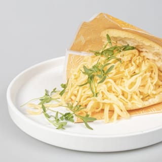 Arepa with Shredded yellow cheese